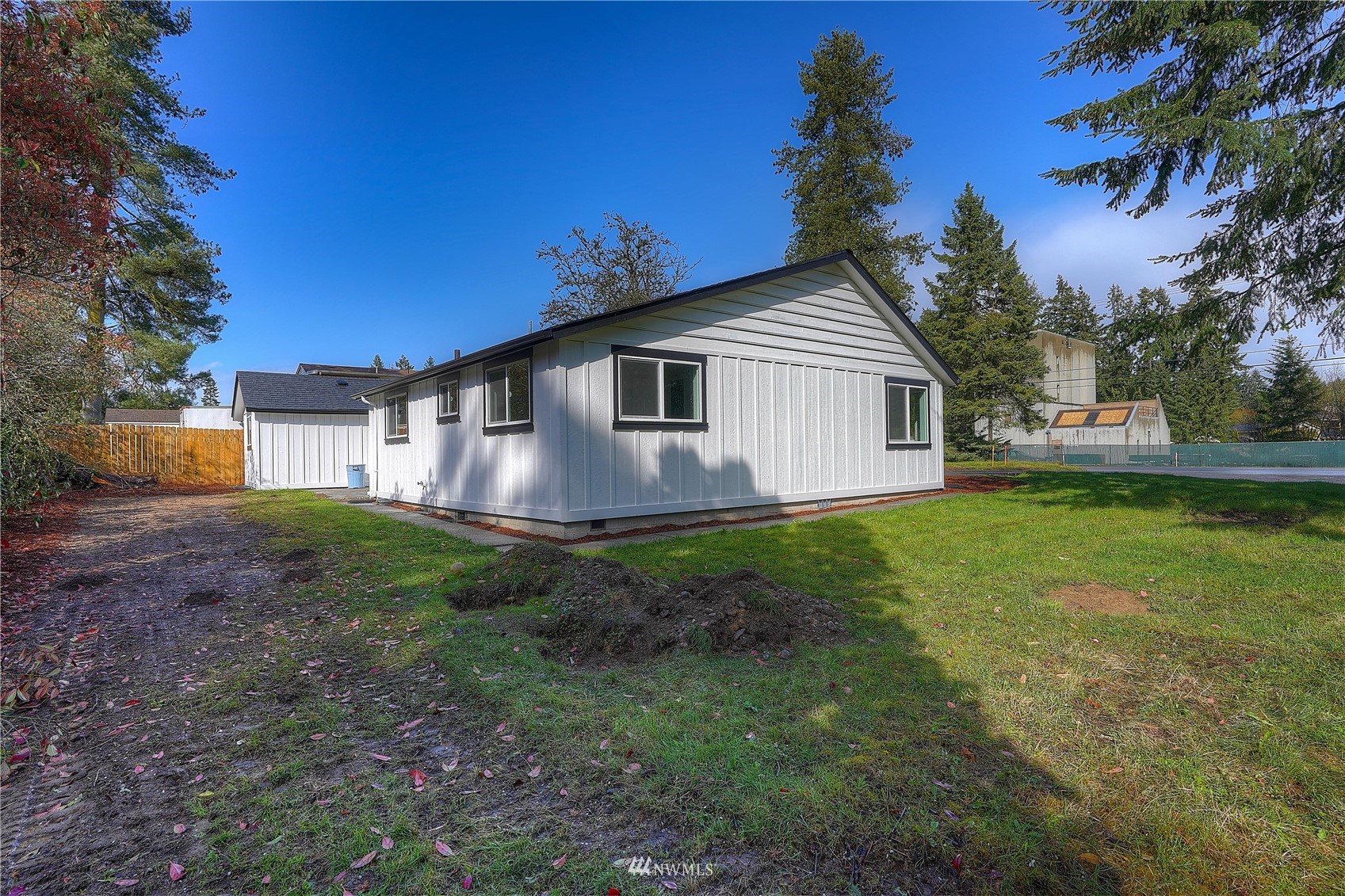 8126 Canyon Road East Puyallup, WA 98371 - Photo 10 of 37 a view of a house with a yard