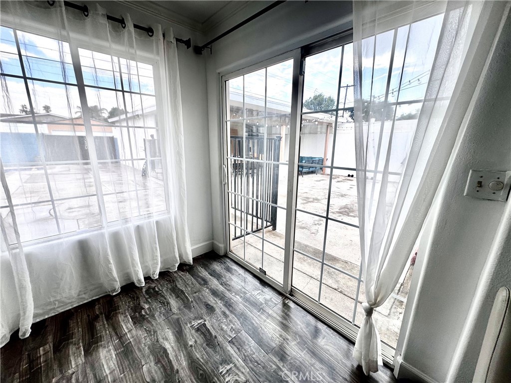 10152 Stanwin Avenue Arleta, CA 91331 - Photo 28 of 42 a view of a window with wooden floor