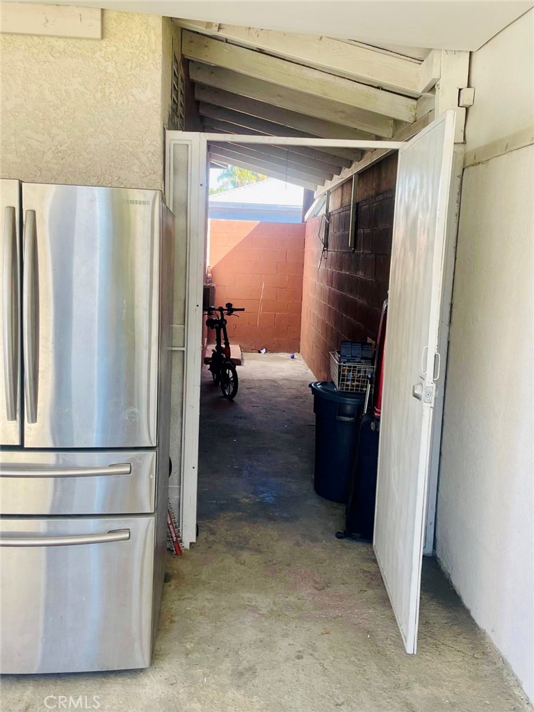 10152 Stanwin Avenue Arleta, CA 91331 - Photo 30 of 42 a view of walk in closet with clothes and shoes