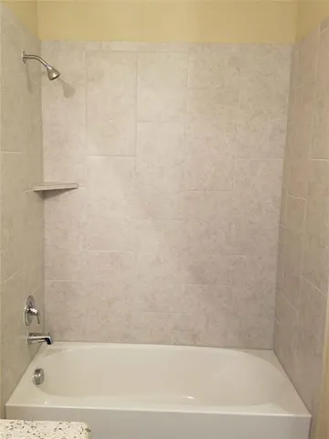 a bathroom with a bathtub