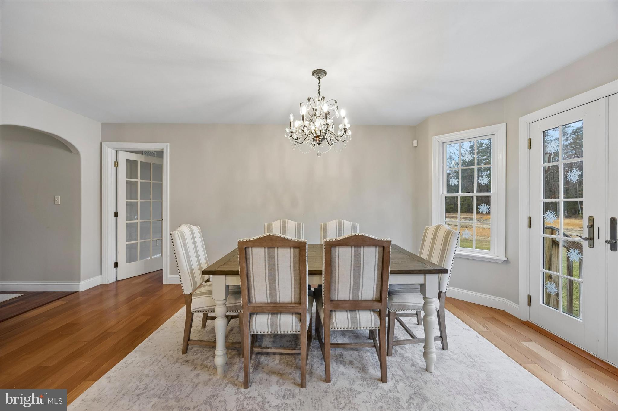 883 Atsion Road Shamong, NJ 08088 - Photo 12 of 42 a view of a dining room with furniture and chandelier