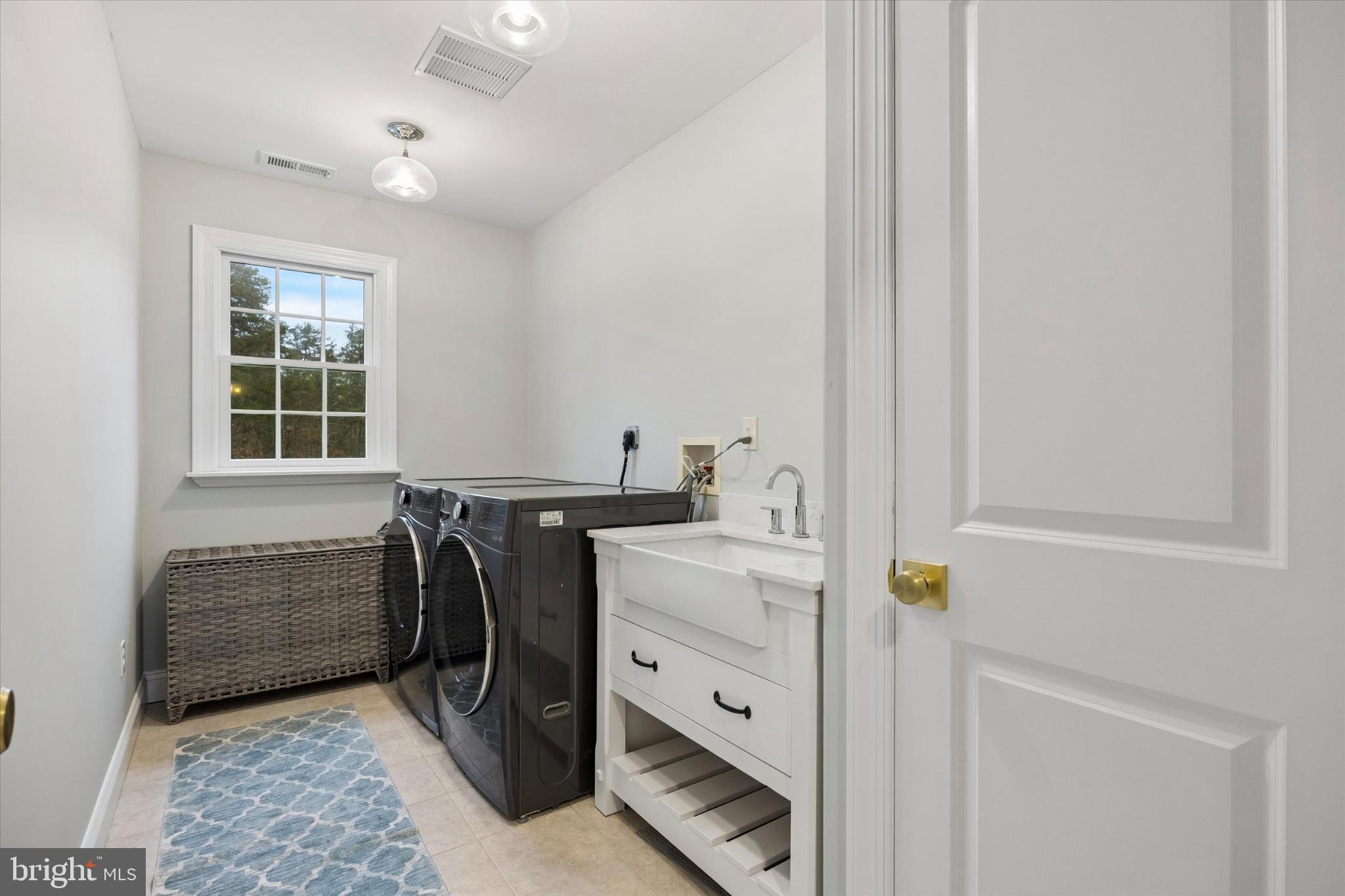 883 Atsion Road Shamong, NJ 08088 - Photo 25 of 42 a utility room with cabinets washer and dryer