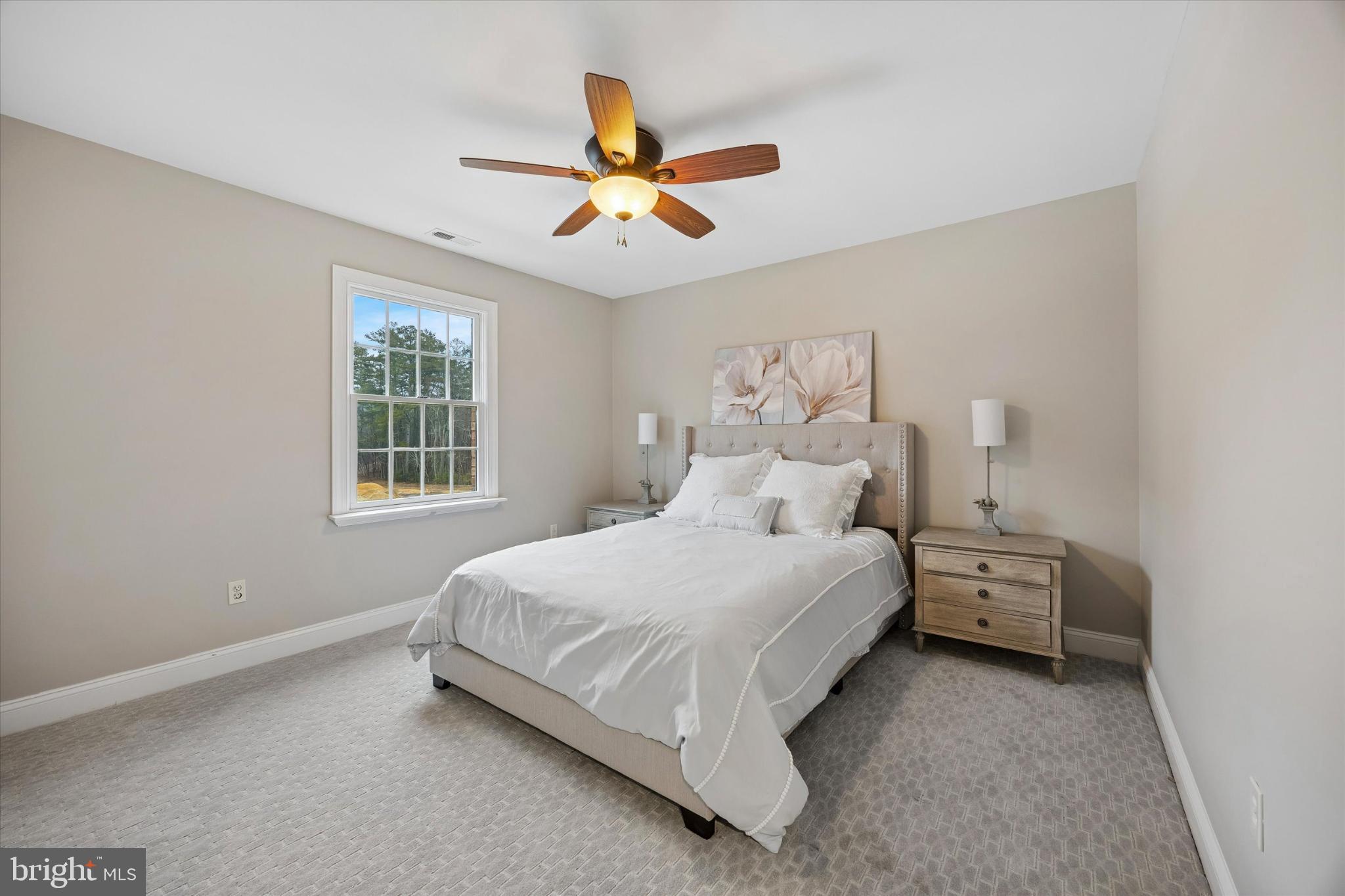 883 Atsion Road Shamong, NJ 08088 - Photo 32 of 42 a bedroom with a bed and a ceiling fan