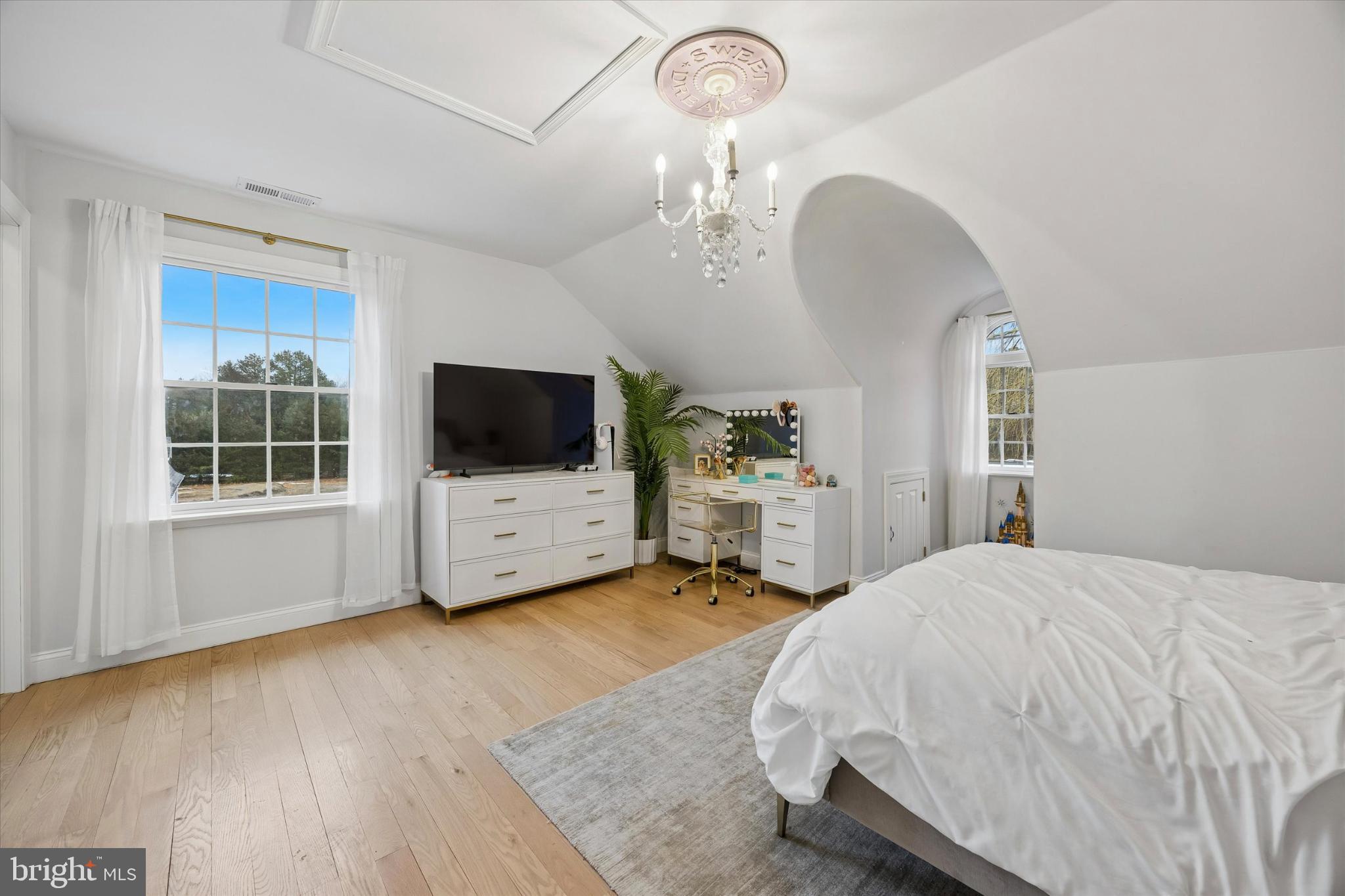 883 Atsion Road Shamong, NJ 08088 - Photo 36 of 42 a spacious bedroom with a bed and a flat screen tv