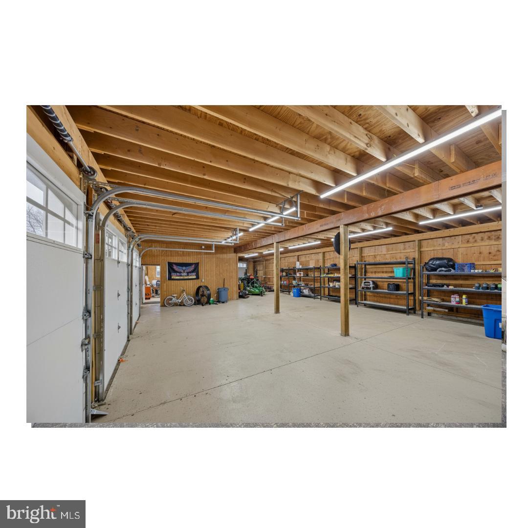 883 Atsion Road Shamong, NJ 08088 - Photo 42 of 42 Spacious garage with ample storage options.