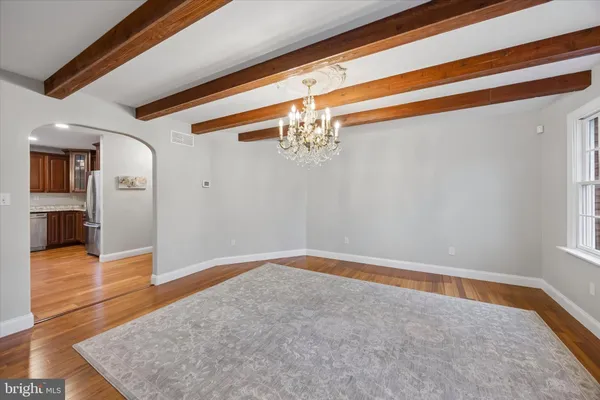 a view of livingroom with hardwood floor and a ceiling fan