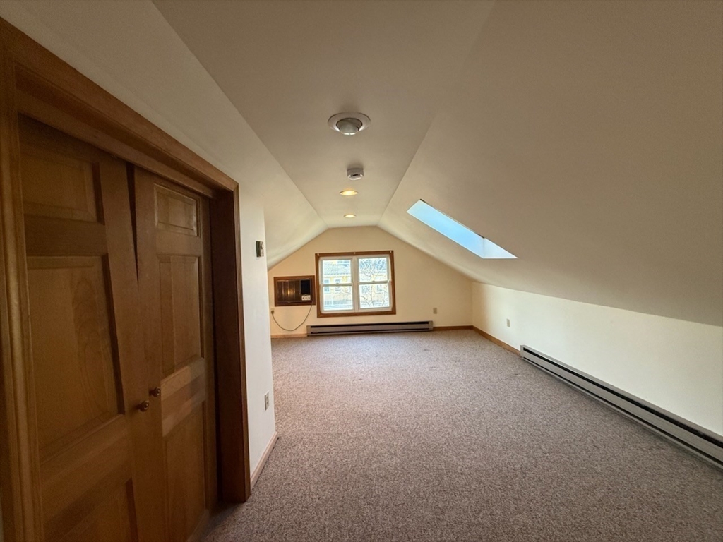 55-57 Evans Street Medford, MA 02155 - Photo 29 of 40 a view of a livingroom with a fireplace