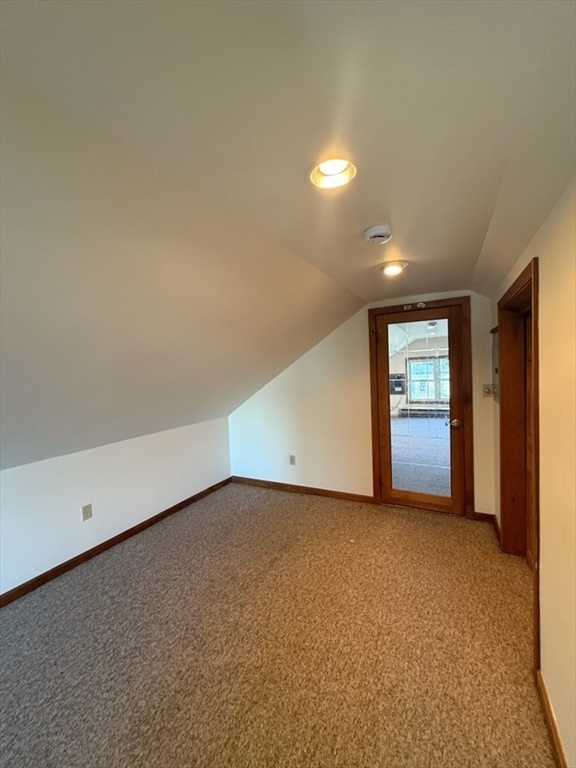 55-57 Evans Street Medford, MA 02155 - Photo 31 of 40 an empty room with a empty space and windows