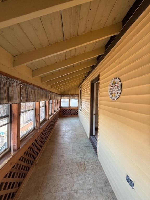 55-57 Evans Street Medford, MA 02155 - Photo 7 of 40 a view of a porch with wooden floor
