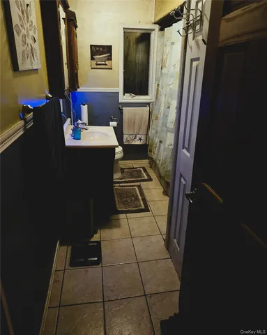 a kitchen with stainless steel appliances kitchen island granite countertop a sink and cabinets