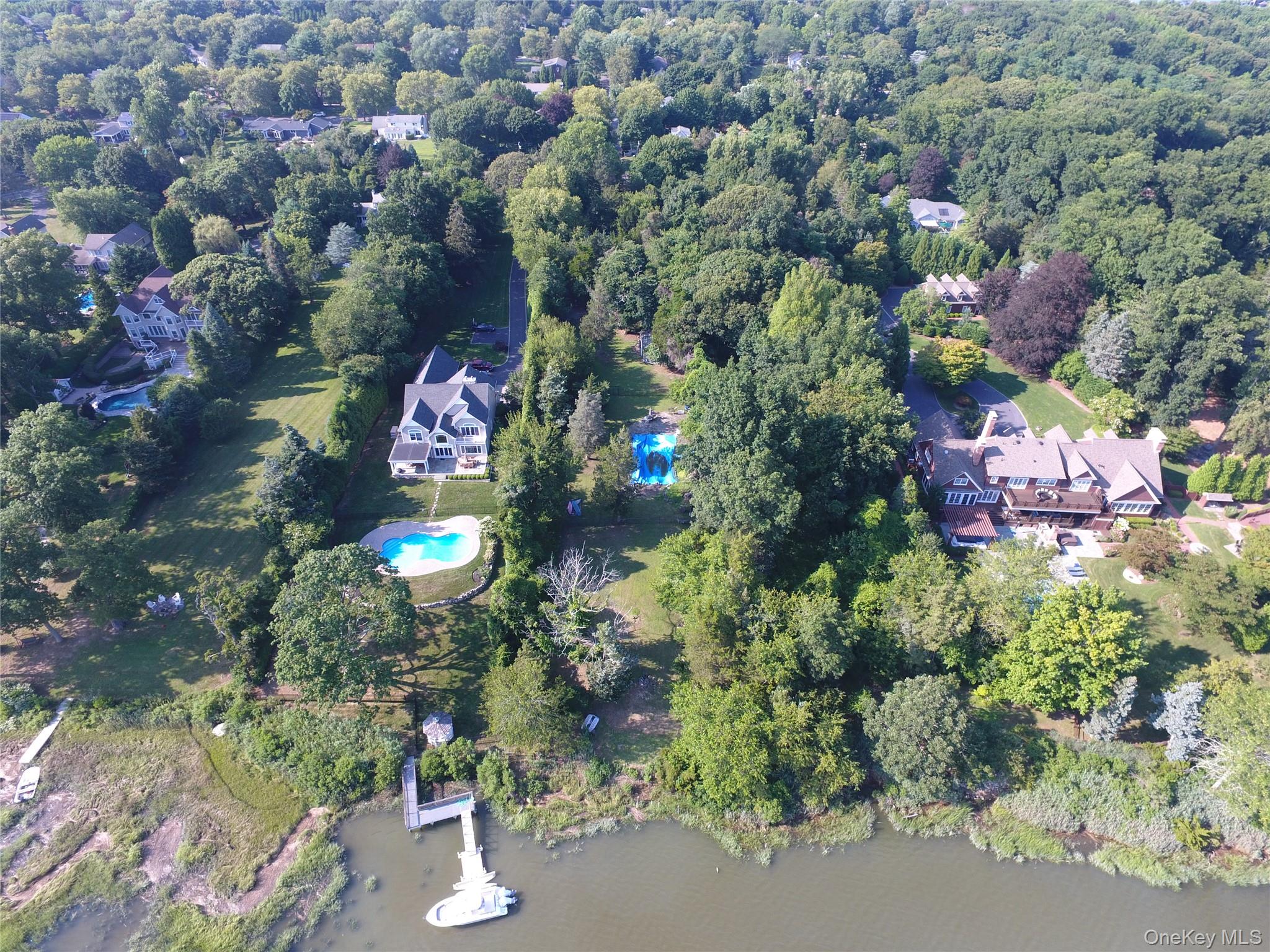 59 Dyke Road East Setauket, NY 11733 - Photo 4 of 5 view of outdoor space and street view