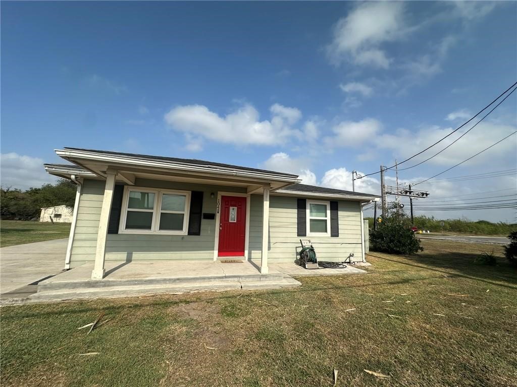 104 2nd Street Gregory, TX 78374 - Photo 1 of 27 a view of a house with backyard