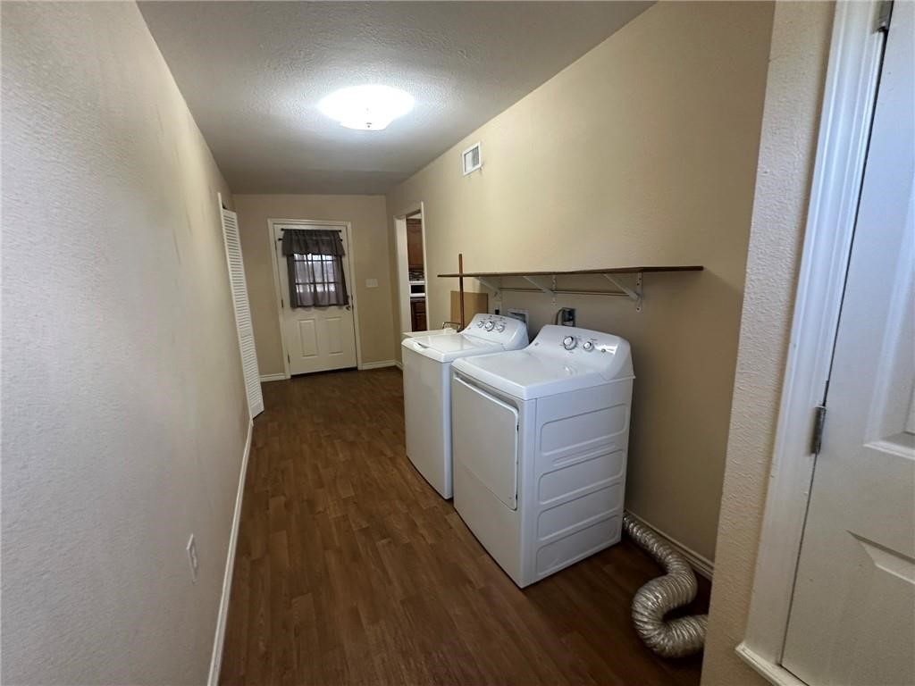 104 2nd Street Gregory, TX 78374 - Photo 14 of 27 a utility room with dryer and washer