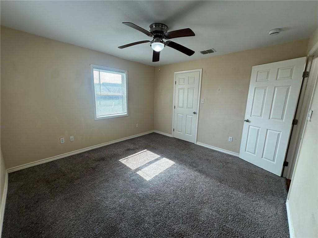 104 2nd Street Gregory, TX 78374 - Photo 19 of 27 a view of an empty room with a window