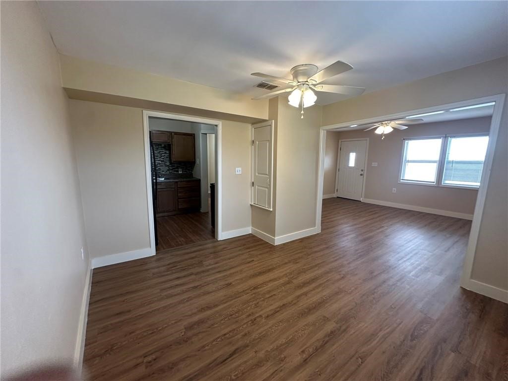 104 2nd Street Gregory, TX 78374 - Photo 10 of 27 a view of a livingroom with wooden floor