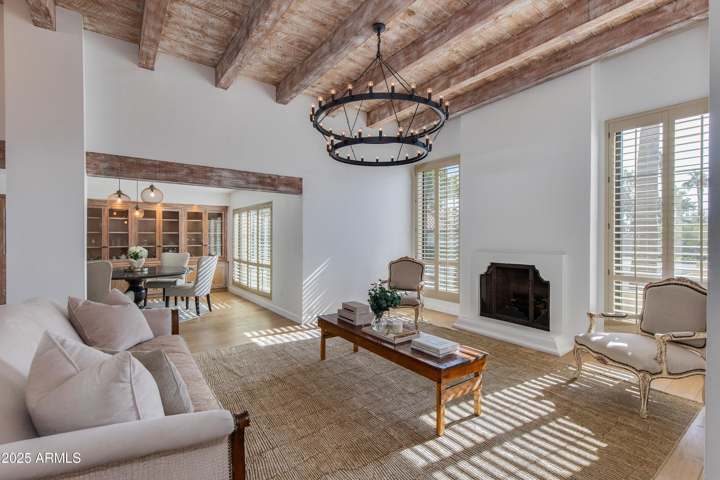 3116 East Rose Lane Phoenix, AZ 85016 - Photo 1 of 24 a living room with furniture and floor to ceiling windows