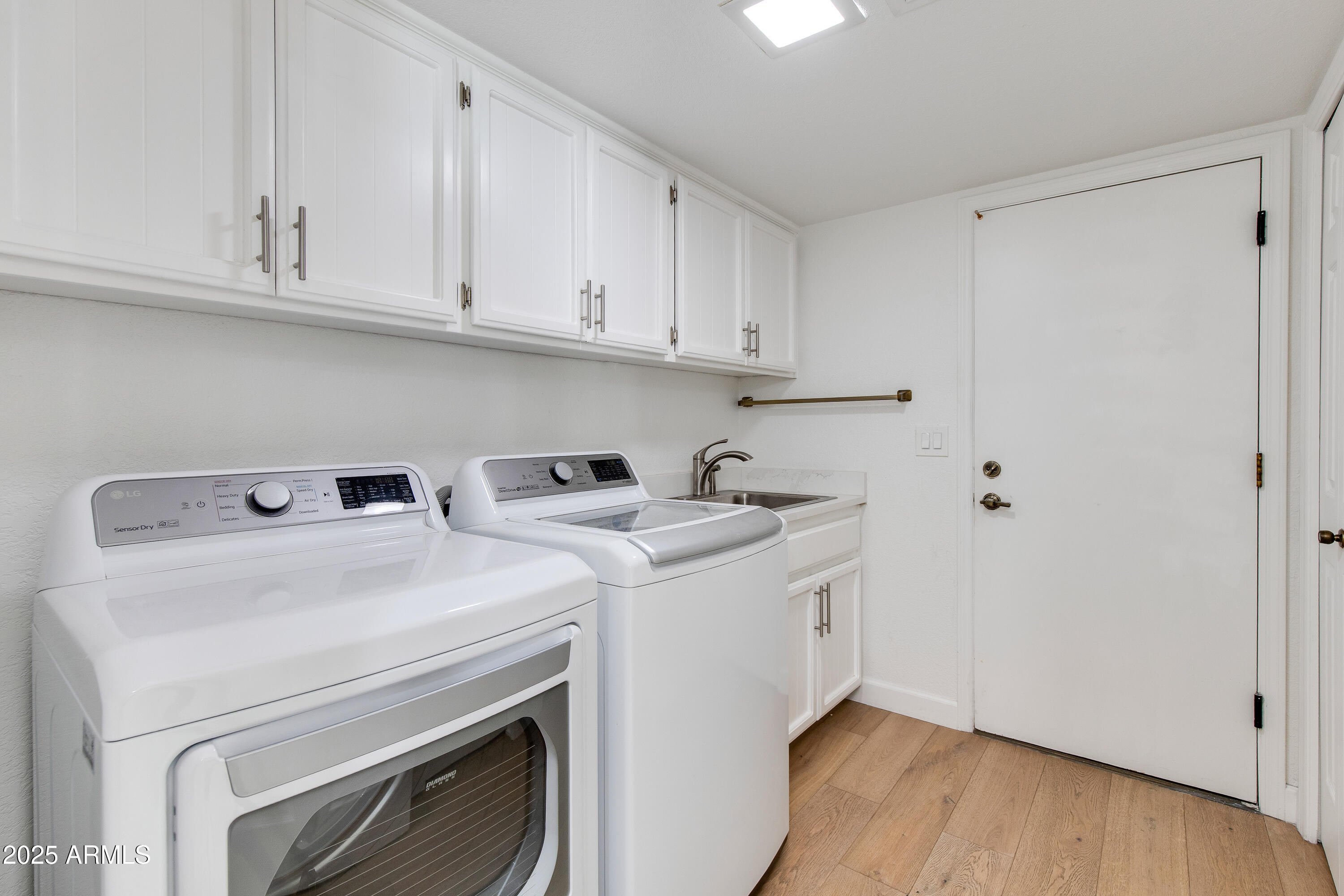 3116 East Rose Lane Phoenix, AZ 85016 - Photo 16 of 24 a utility room with dryer and washer