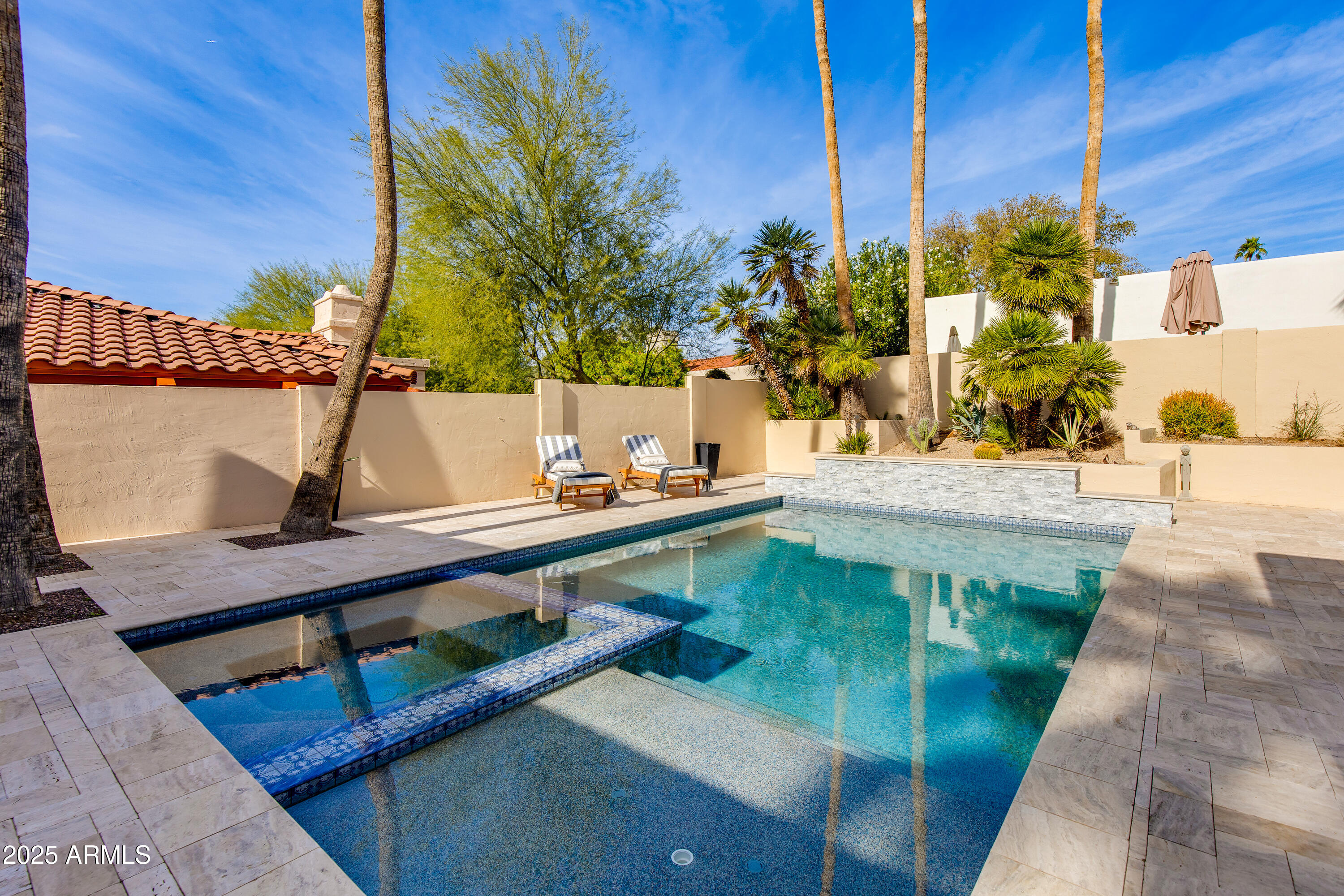 3116 East Rose Lane Phoenix, AZ 85016 - Photo 18 of 24 a view of a swimming pool with a patio