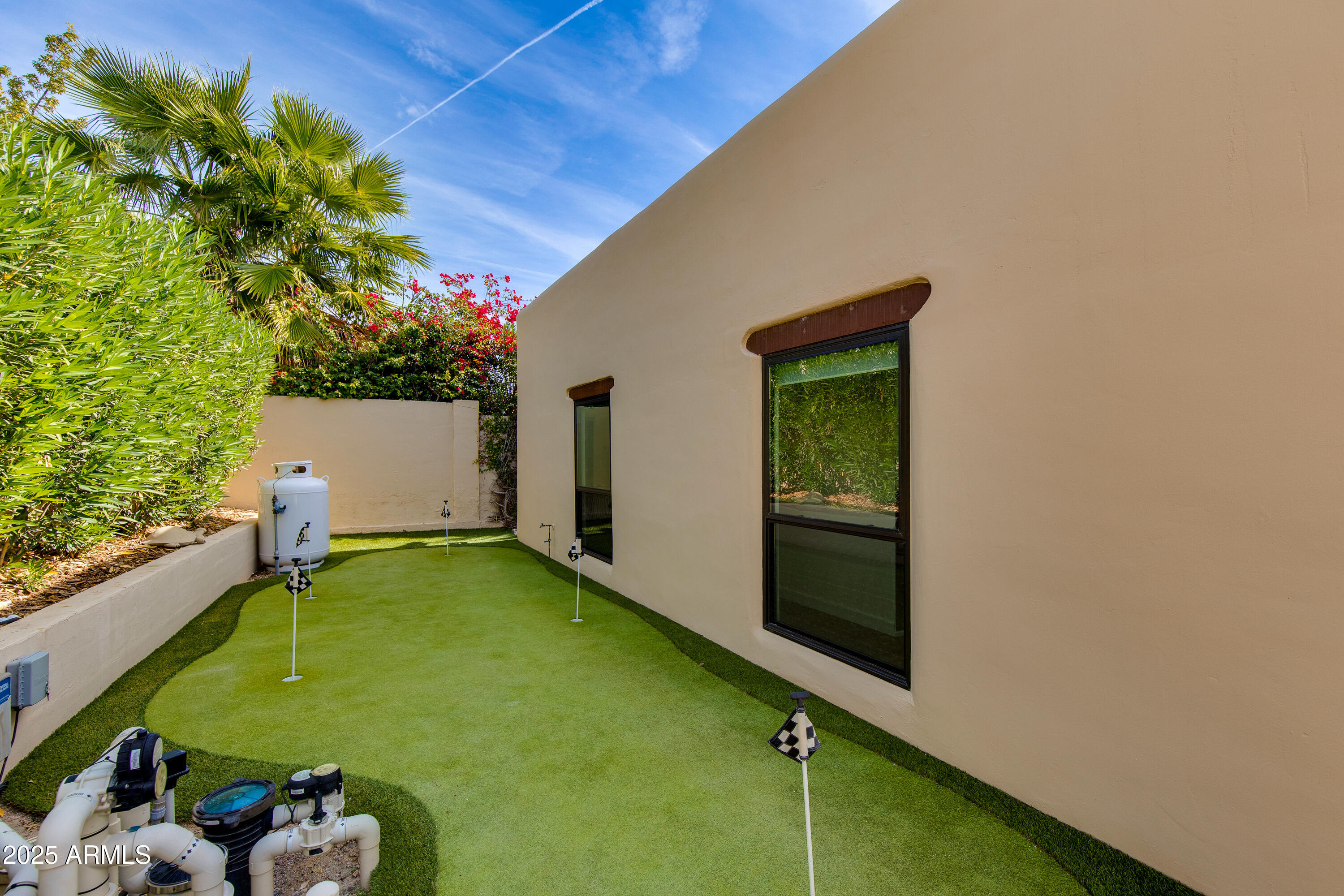 3116 East Rose Lane Phoenix, AZ 85016 - Photo 21 of 24 a backyard of a house with table and chairs