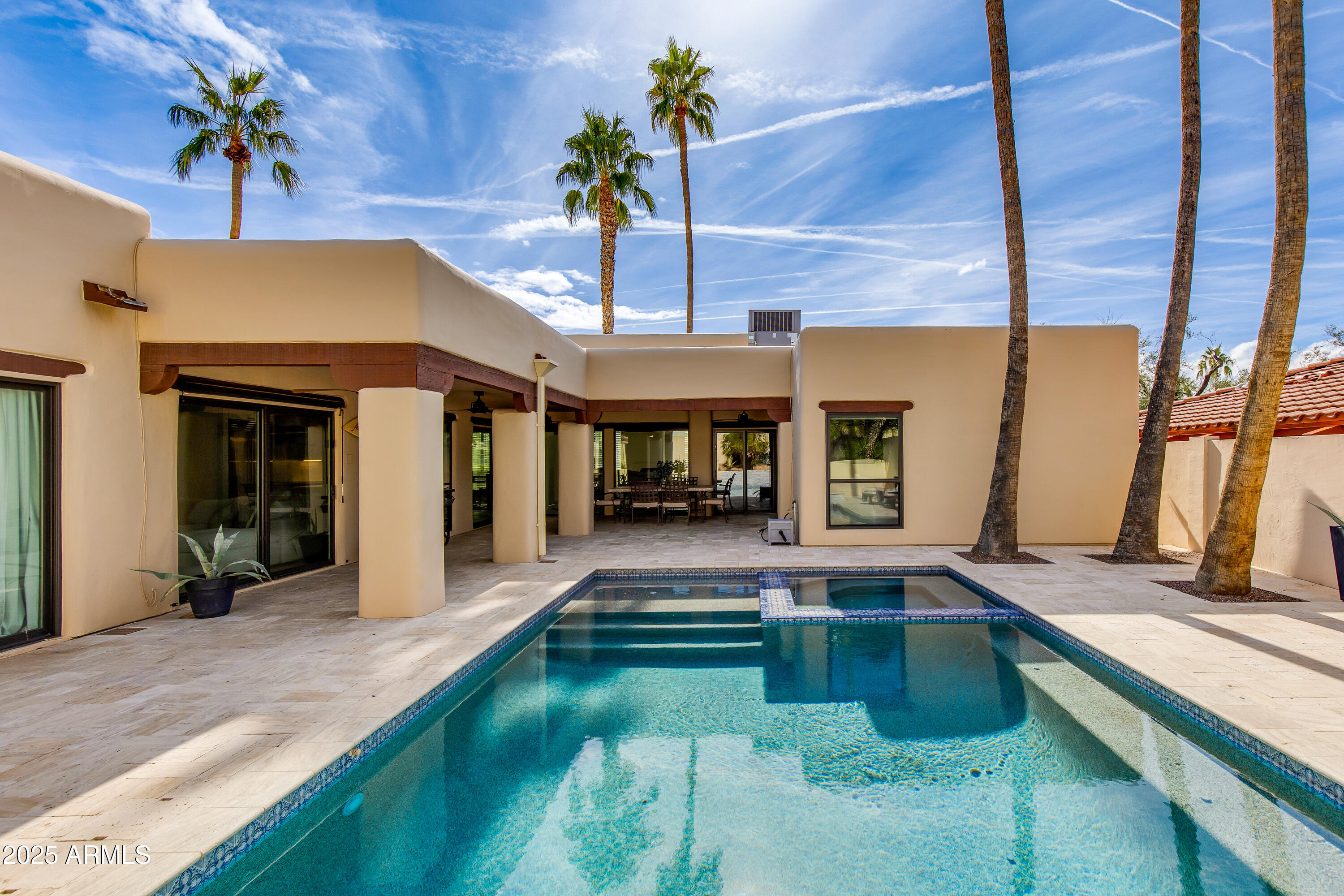 3116 East Rose Lane Phoenix, AZ 85016 - Photo 22 of 24 a view of a living room and a swimming pool