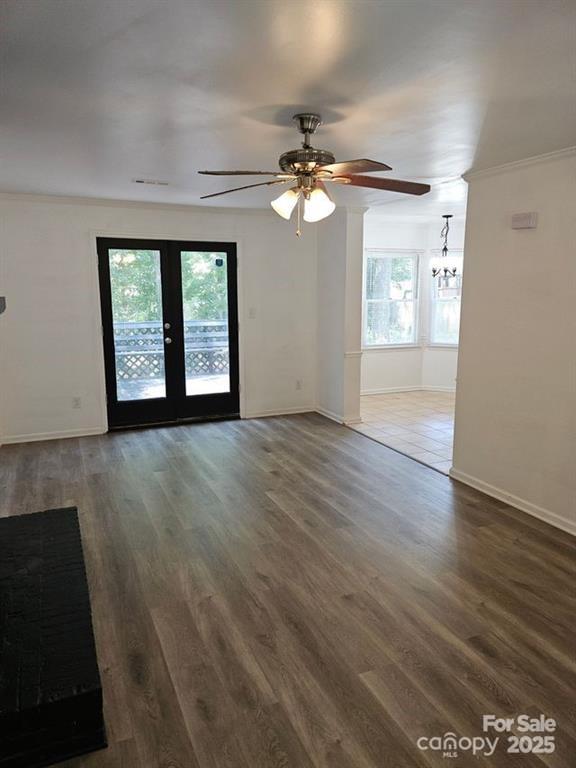 2819 Royal Ridge Lane Charlotte, NC 28212 - Photo 10 of 15 a view of an empty room with wooden floor and a window
