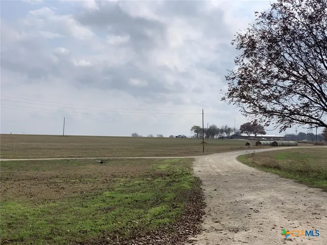 a view of a lake with a big yard
