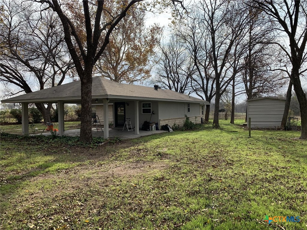1902 State Highway 95 Little River-Academy, TX 76554 - Photo 4 of 20 a view of a house with a yard and tree s
