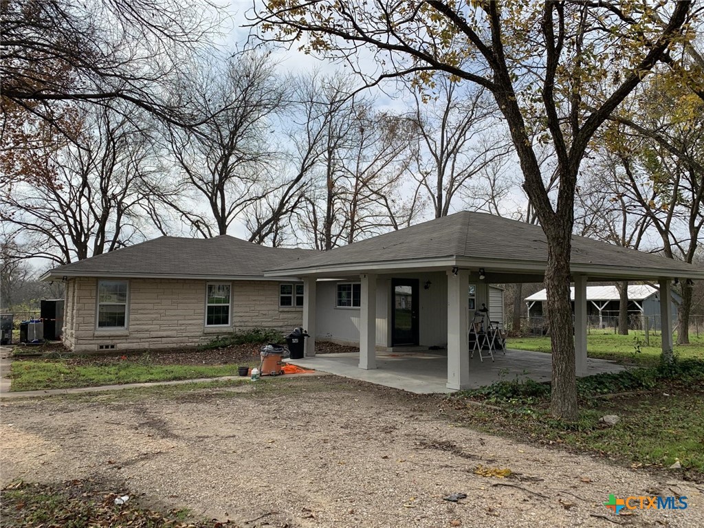 1902 State Highway 95 Little River-Academy, TX 76554 - Photo 5 of 20 a front view of a house with yard and seating space