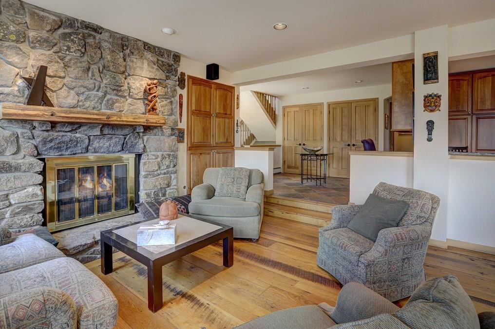 213 4 O'Clock Run Road Breckenridge, CO 80424 - Photo 8 of 34 a living room with furniture and a fireplace