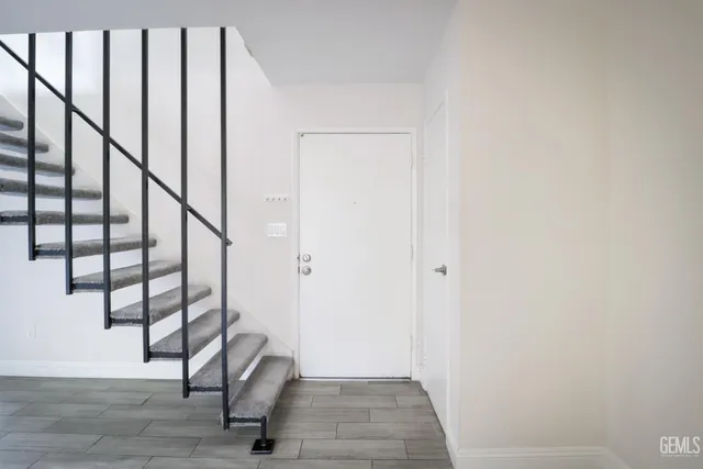 a view of entryway with wooden floor