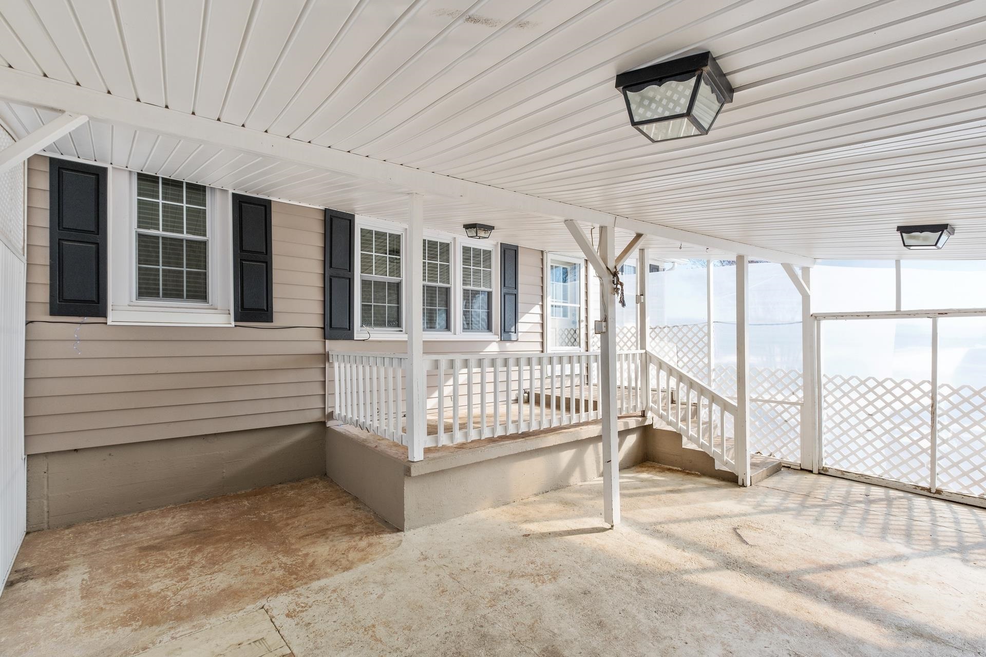 7720 Port Republic Road Port Republic, VA 24471 - Photo 18 of 35 a view of a porch with a bench