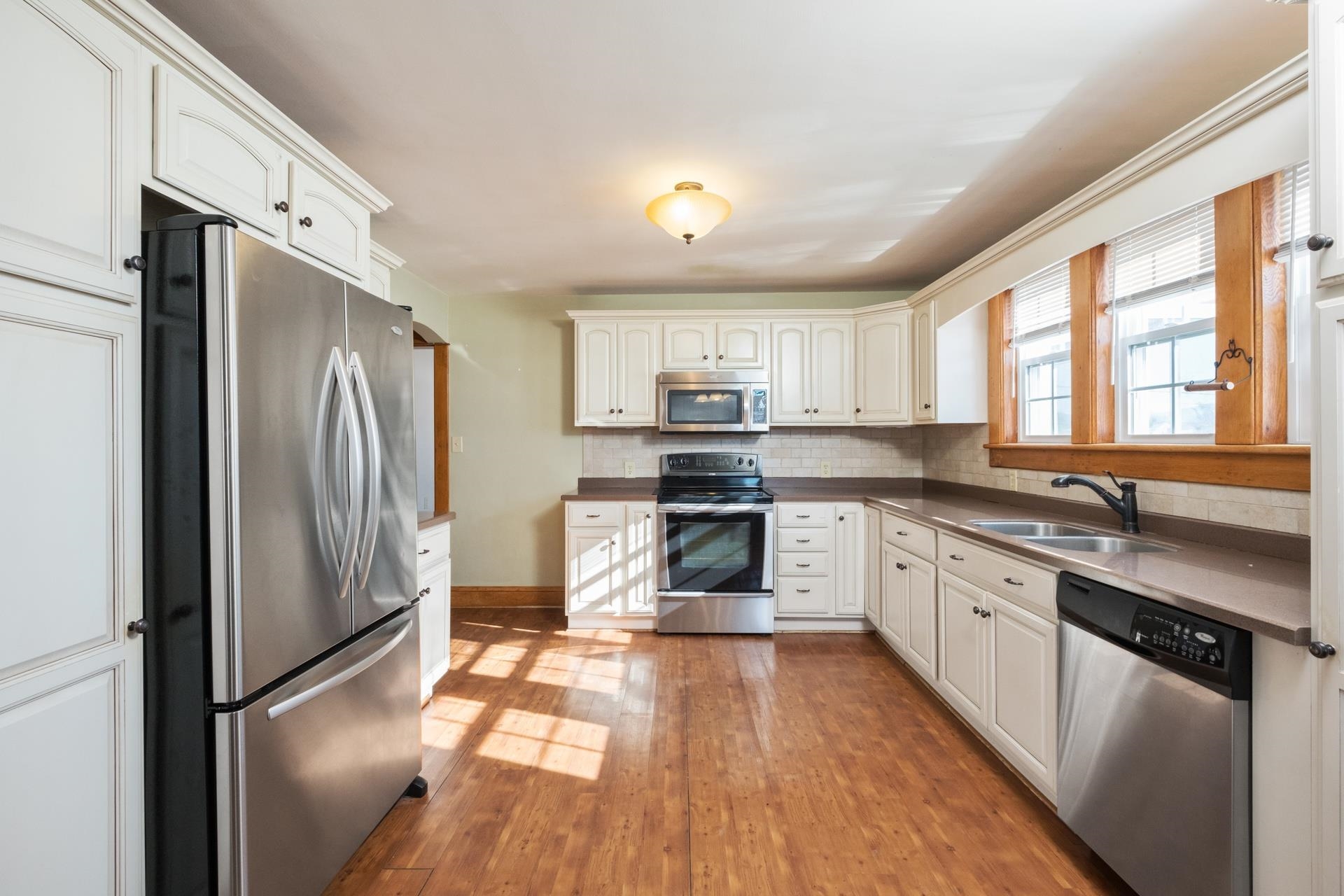 7720 Port Republic Road Port Republic, VA 24471 - Photo 22 of 35 a kitchen with stainless steel appliances granite countertop a refrigerator stove top oven and sink