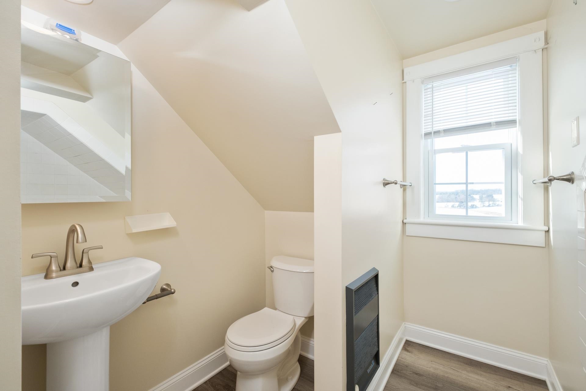 7720 Port Republic Road Port Republic, VA 24471 - Photo 32 of 35 a bathroom with a sink toilet and a mirror