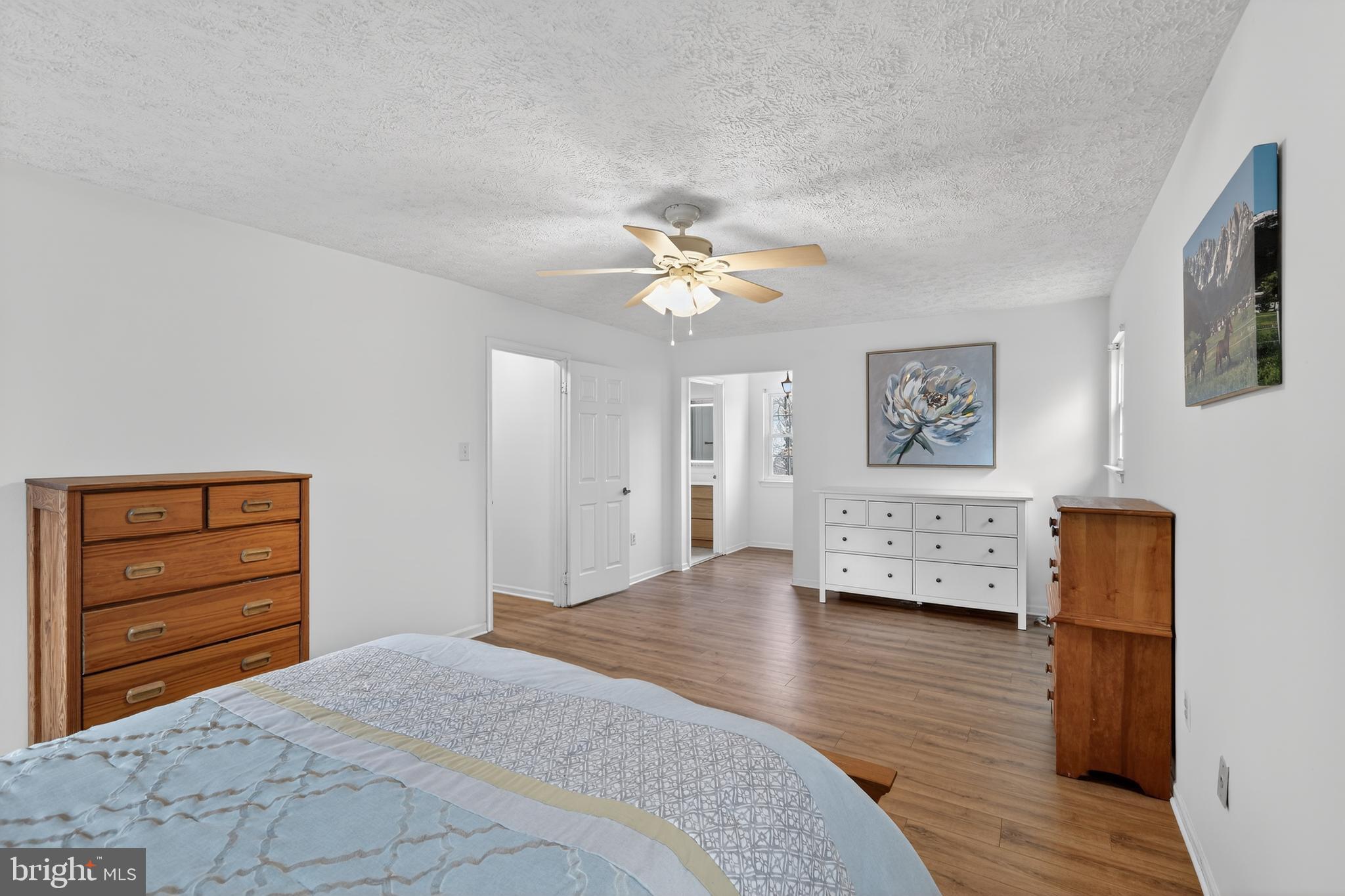7200 Beachway Court Springfield, VA 22153 - Photo 14 of 31 a bedroom with a bed and a dresser