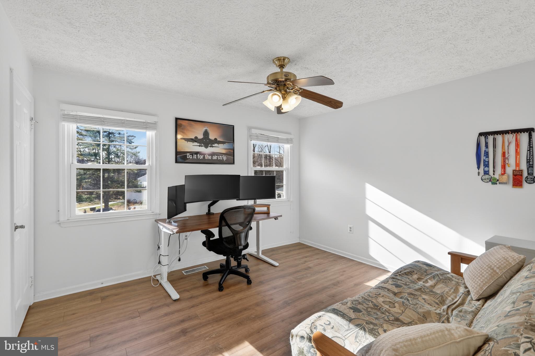 7200 Beachway Court Springfield, VA 22153 - Photo 16 of 31 a workspace with wooden floor and a workspace