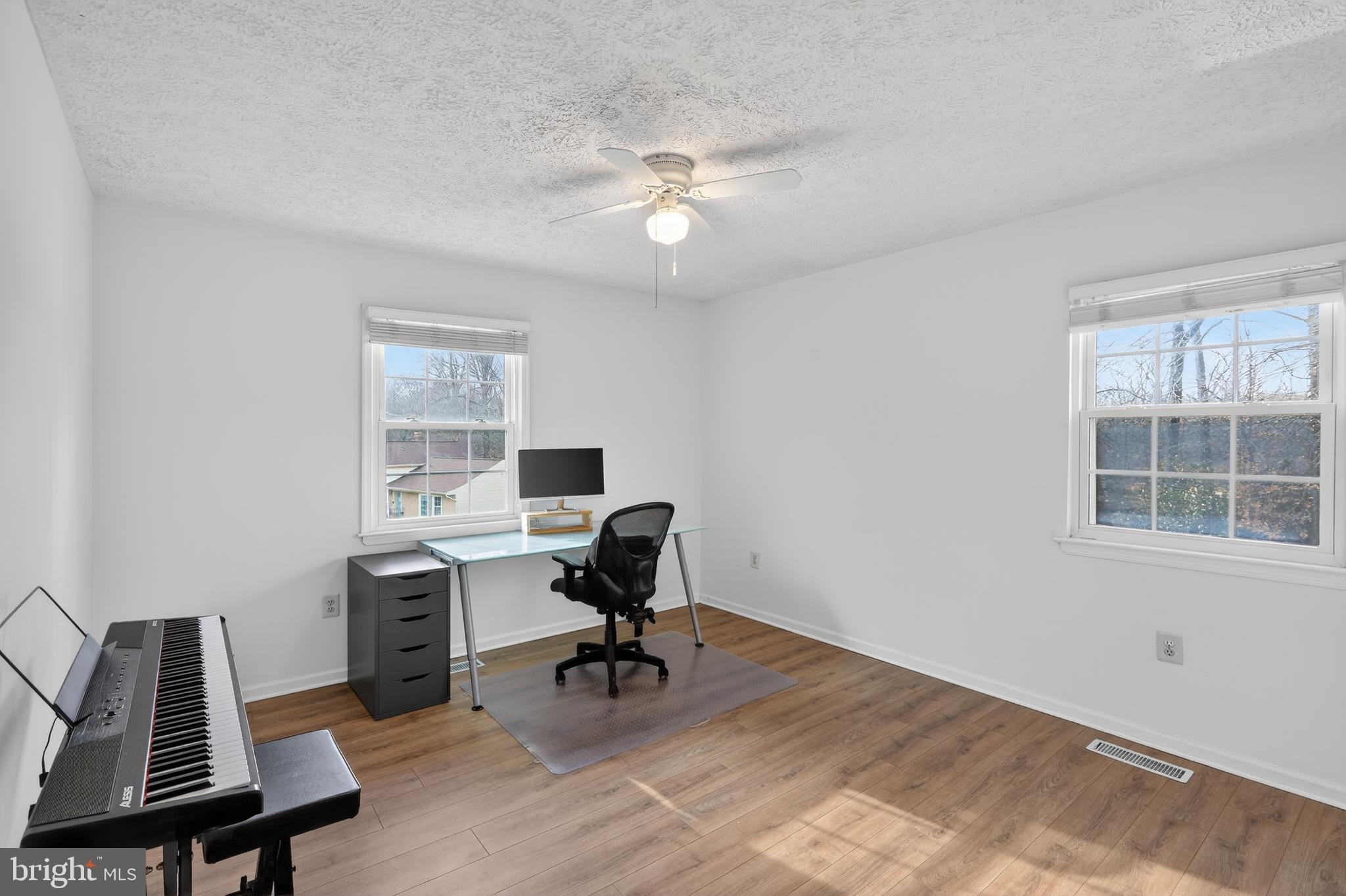 7200 Beachway Court Springfield, VA 22153 - Photo 17 of 31 a view of a workspace with furniture and a window
