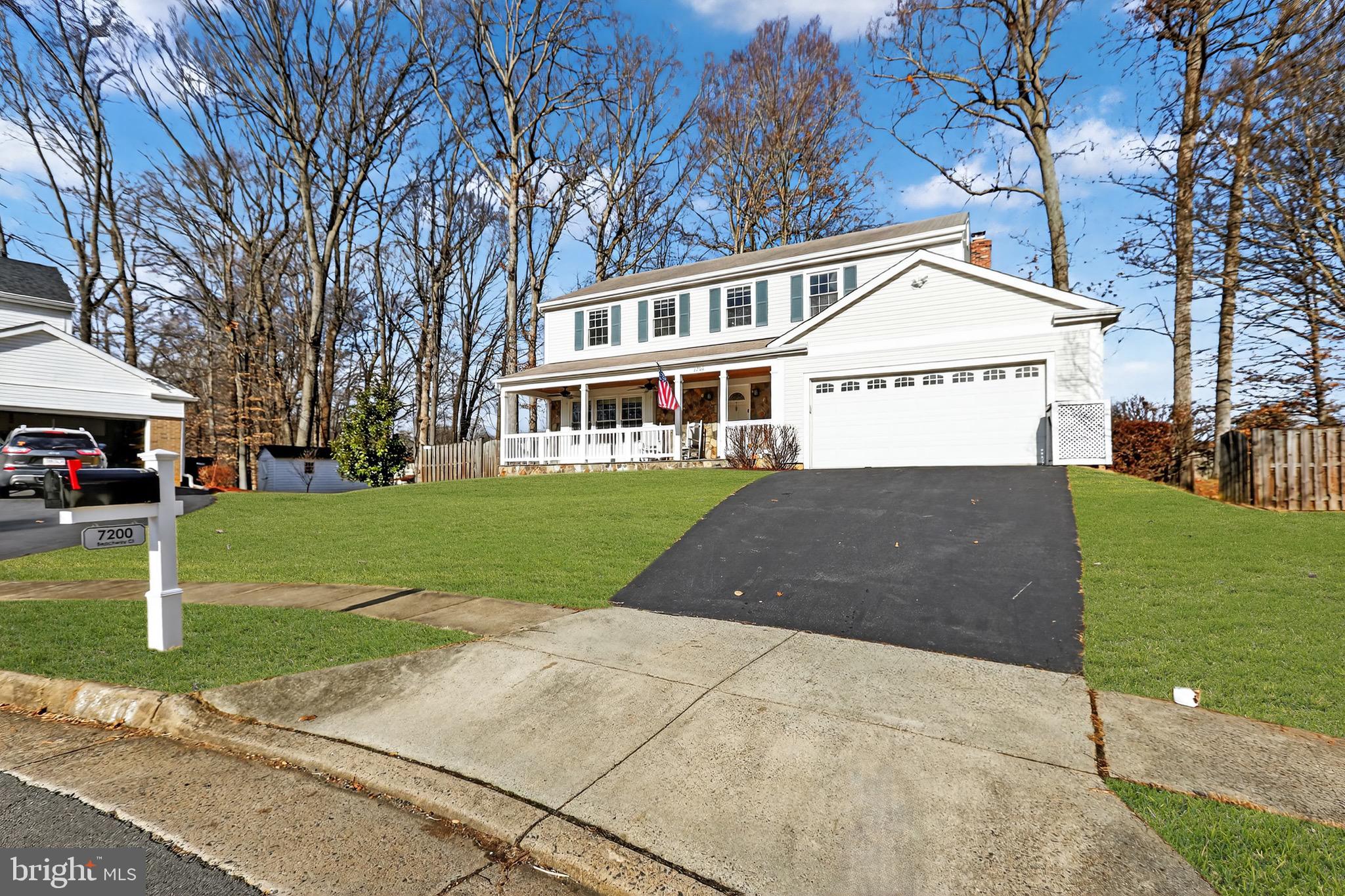 7200 Beachway Court Springfield, VA 22153 - Photo 27 of 31 a front view of a house with a yard and trees