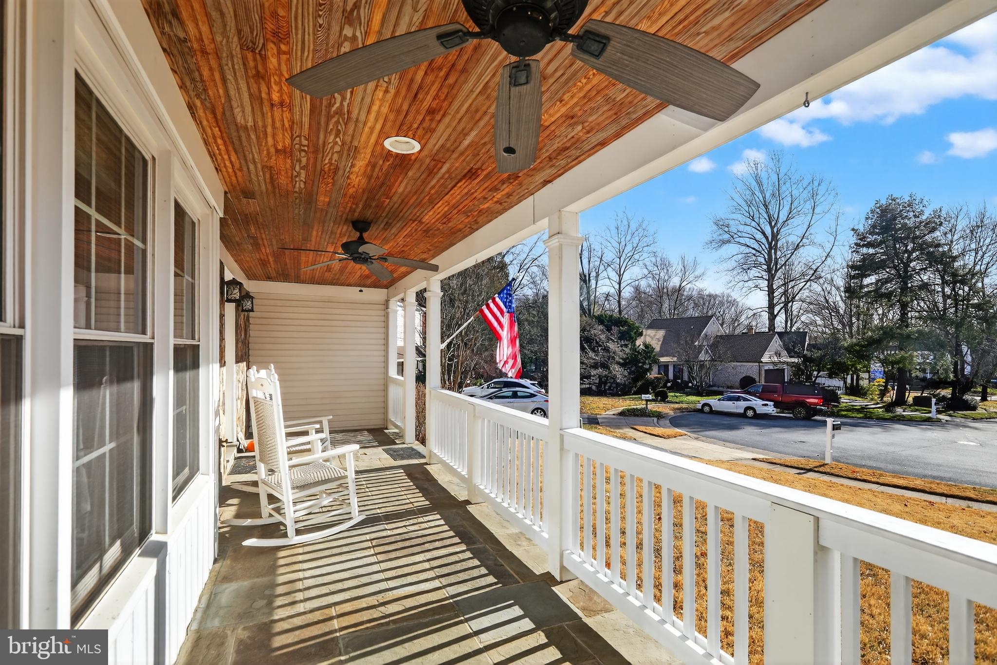 7200 Beachway Court Springfield, VA 22153 - Photo 3 of 31 a view of a porch with wooden floor and iron fence
