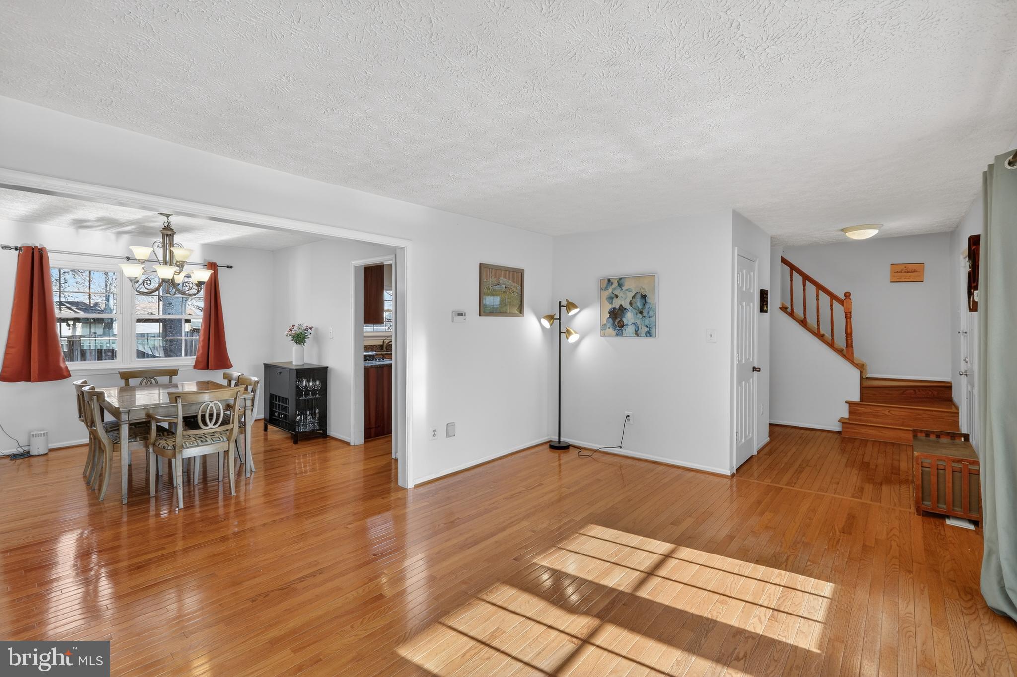 7200 Beachway Court Springfield, VA 22153 - Photo 9 of 31 a view of a livingroom with furniture and wooden floor