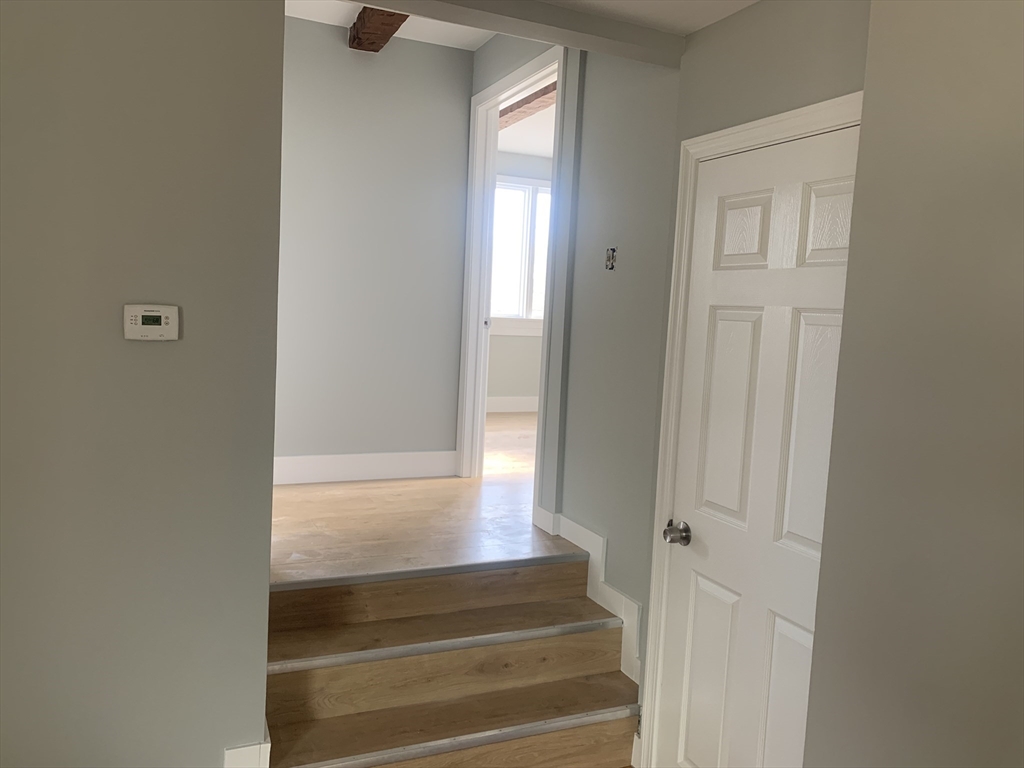 3161 Cranberry Highway, Unit 2 Wareham, MA 02538 - Photo 6 of 9 a view of an entryway with wooden floor