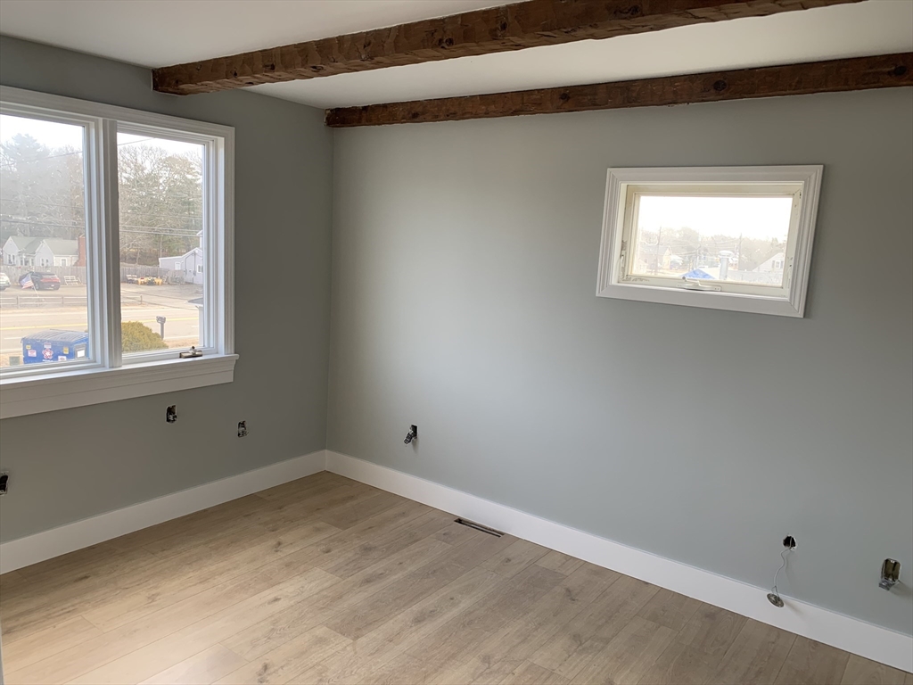 3161 Cranberry Highway, Unit 2 Wareham, MA 02538 - Photo 8 of 9 an empty room with a window