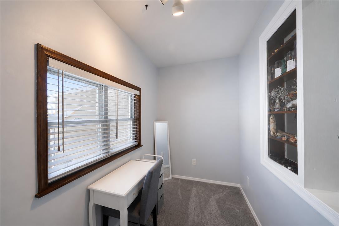 649 Furnace Street Emmaus, PA 18049 - Photo 13 of 24 A well-lit study space features a built-in display shelf and window for optimal comfort and productivity.