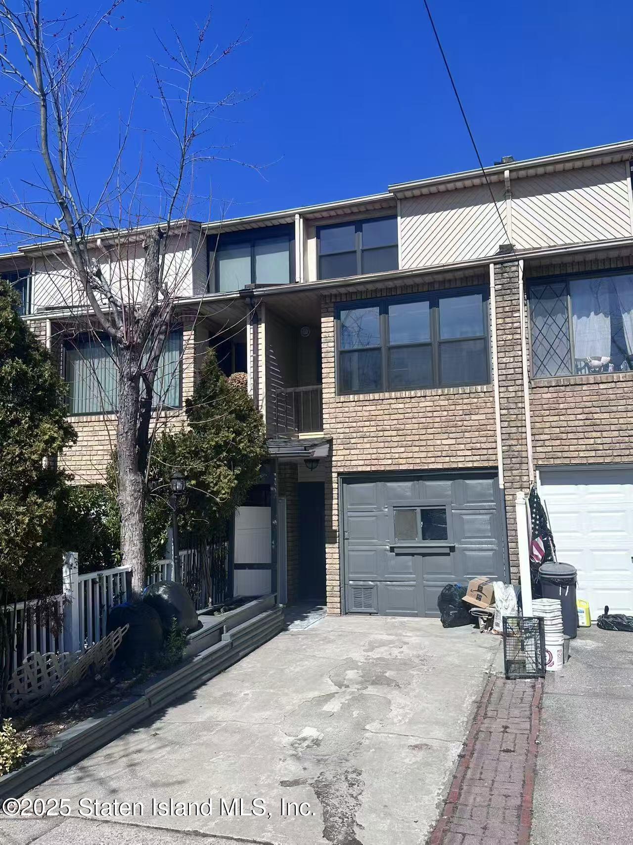 19 Drumgoole Road East Staten Island, NY 10312 - Photo 1 of 13 a front view of a house with yard