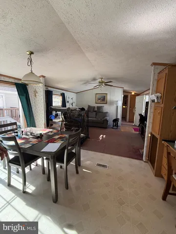 a view of a livingroom and dining room