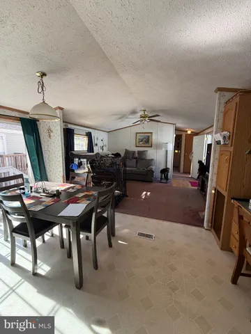 a view of a livingroom and dining room