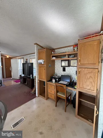 a bed room with furniture and a window