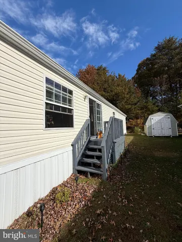 a view of a back yard of the house