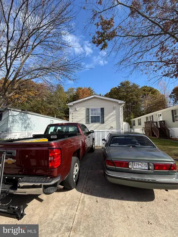 a car parked in front of a house