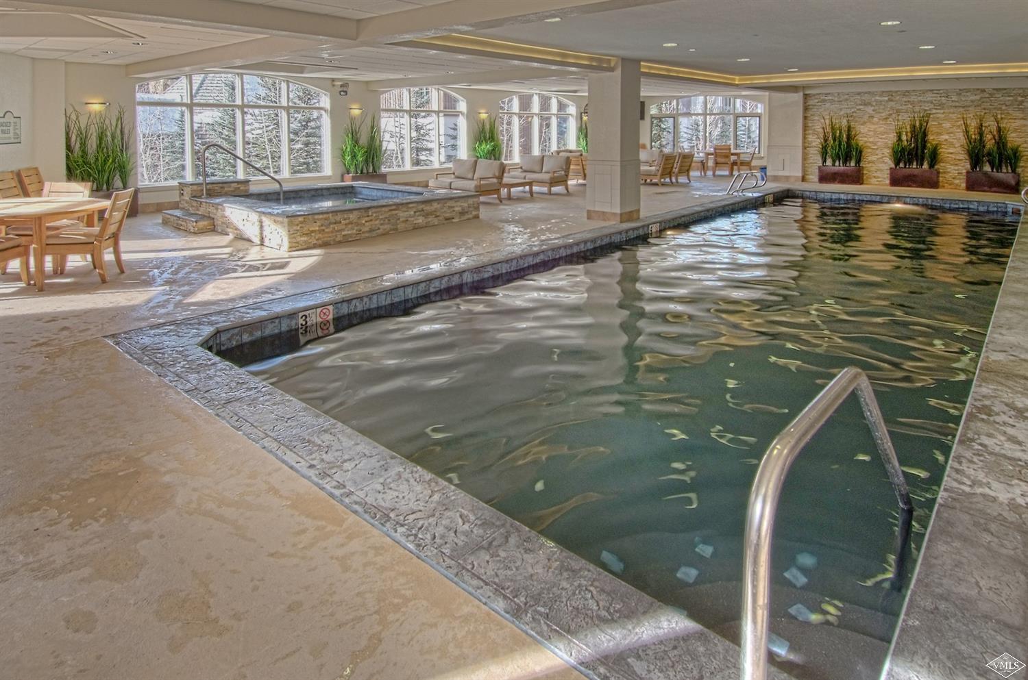 210 Week 27 Offerson Road, Unit 310 WEEK 27 Beaver Creek, CO 81620 - Photo 6 of 7 a view of a living room and kitchen