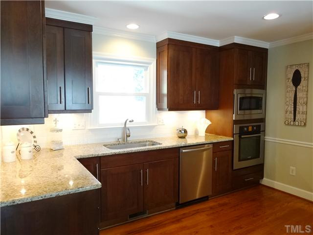 413 Kenwood Court Raleigh, NC 27609 - Photo 7 of 19 Wall mounted ovens & task lighting make any meal preparation a breeze. Kitchen